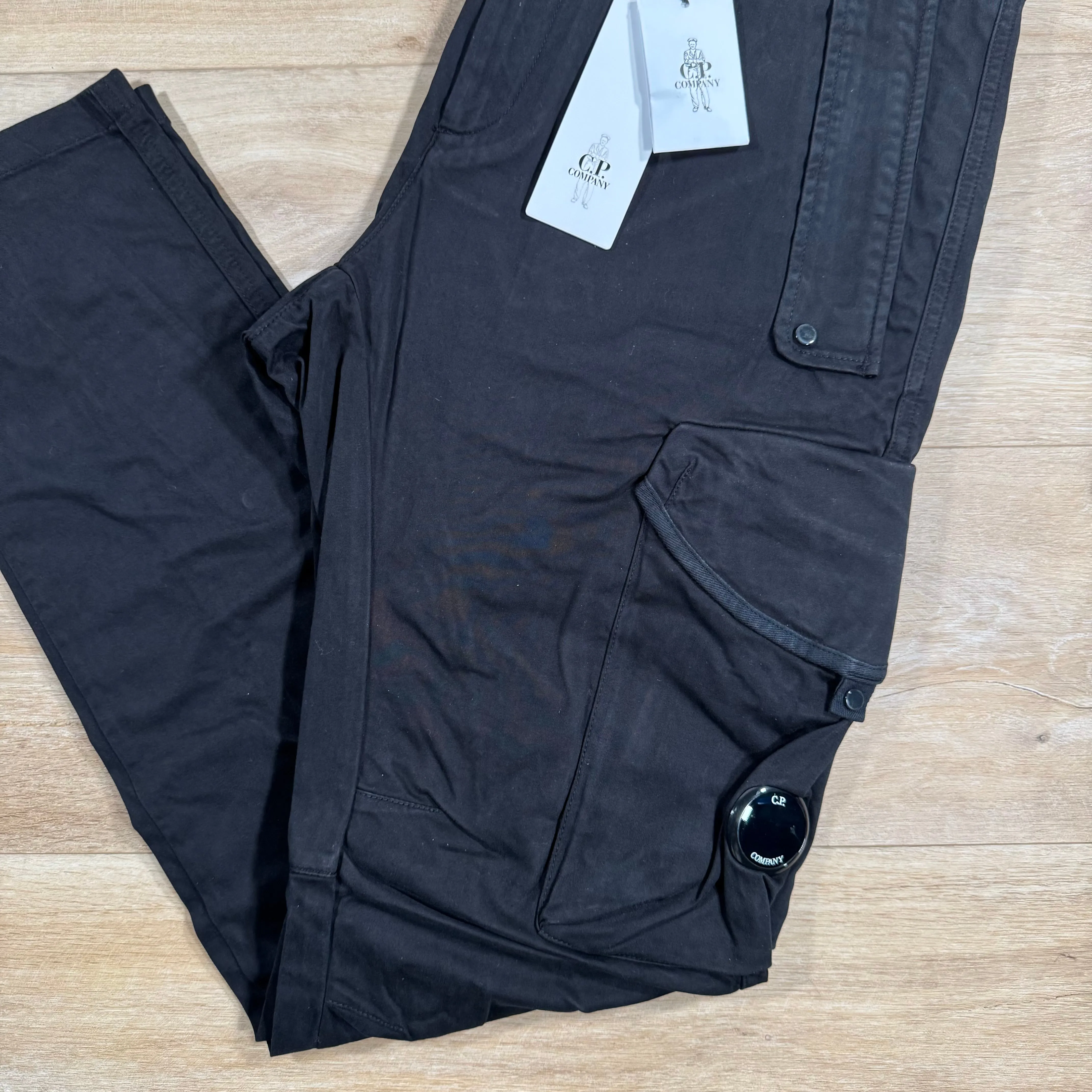 C.P. Company Stretch Sateen Ergonomic Lens Cargo Pants in Black